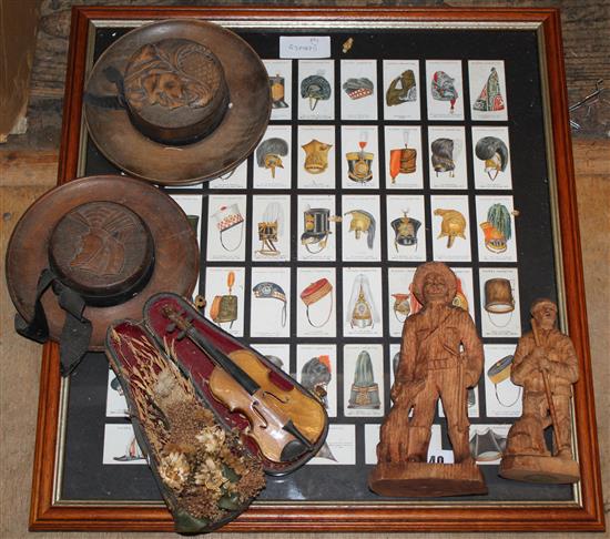 Framed cig cards, carvings & miniature violin